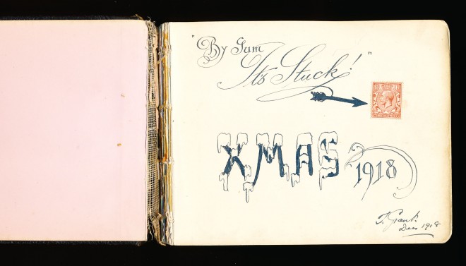 Autograph entry: Xmas 1918 illustration w/ King George V three halfpence stamp. ”By gum, it’s stuck!” ”J. Grant Dec 1918”