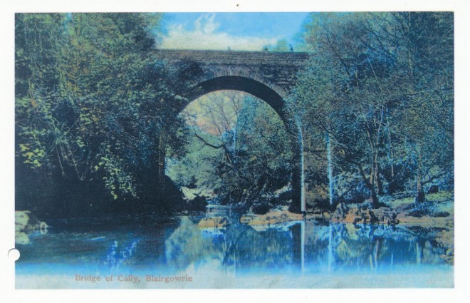 Colourised photograph of Bridge of Cally.  In other words, a black-and-white photograph has had colours added later. 