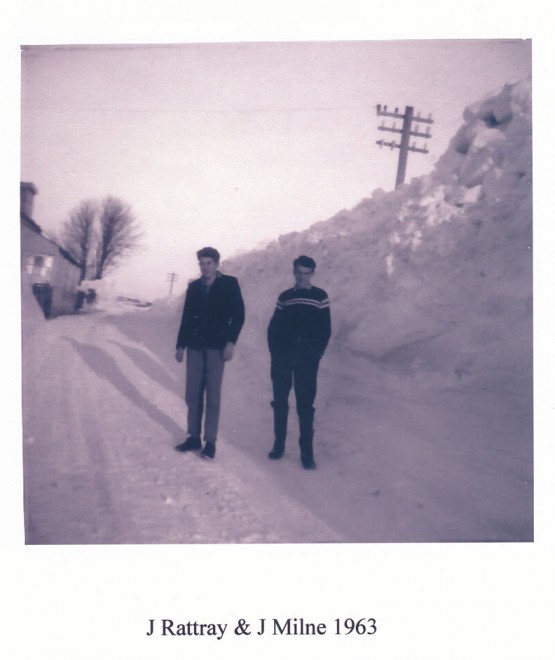 J Rattray and John MIlne on a road that has been cleared, 1963.