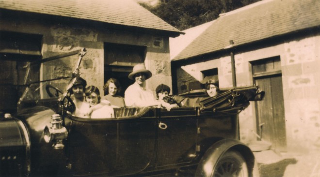 Women in car, c. 1920.