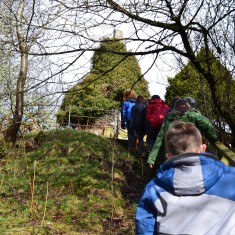 The memorial can be seen in the centre of the image. It was presumably placed on top of the hill so it could be seen for miles around. Unfortunately, trees now obscure it.